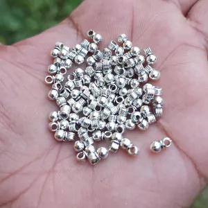 50 PIECES PACK' 4x6 MM' SILVER OXIDIZED SOLID ROUND ADORNMENT CHARMS