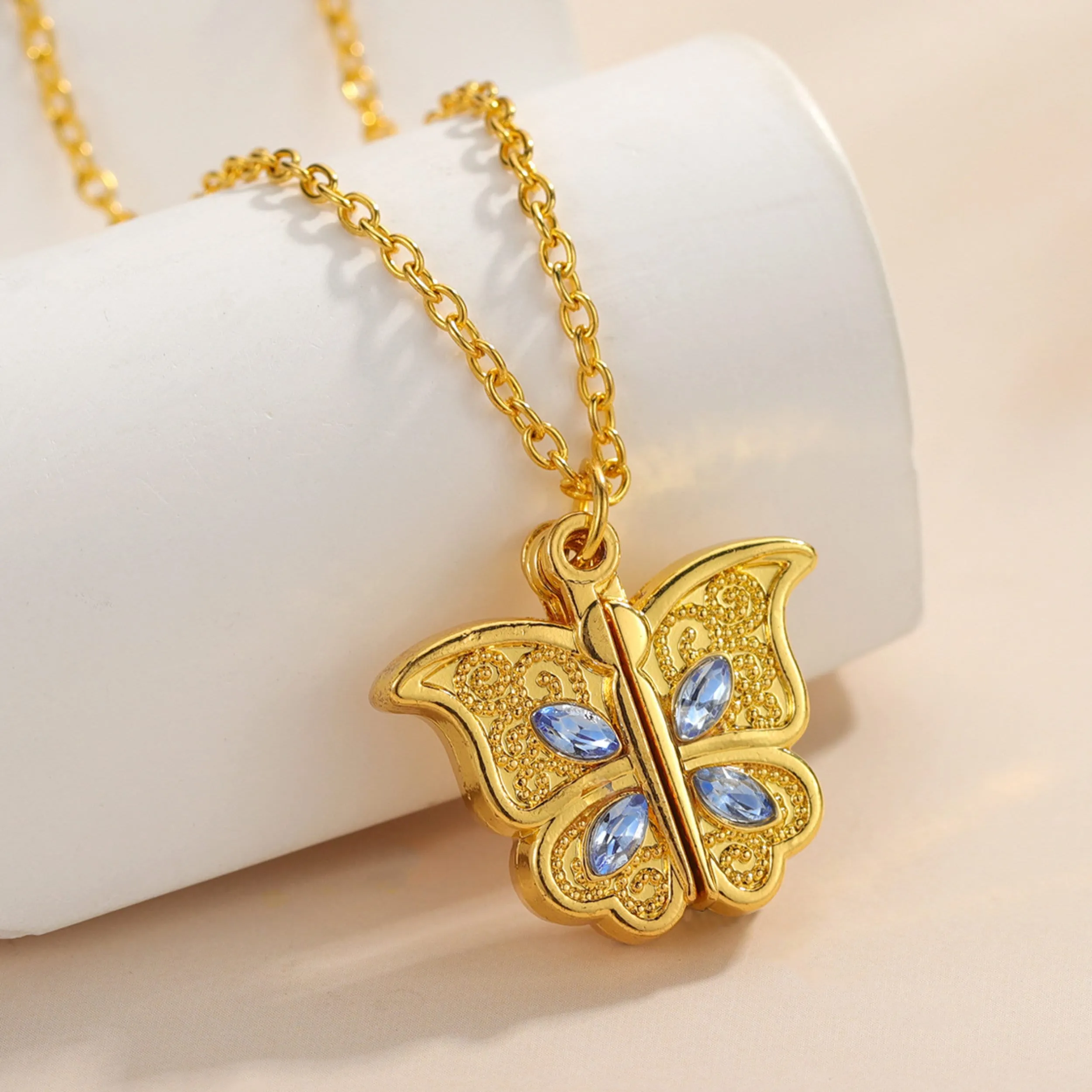 Butterfly locket necklace