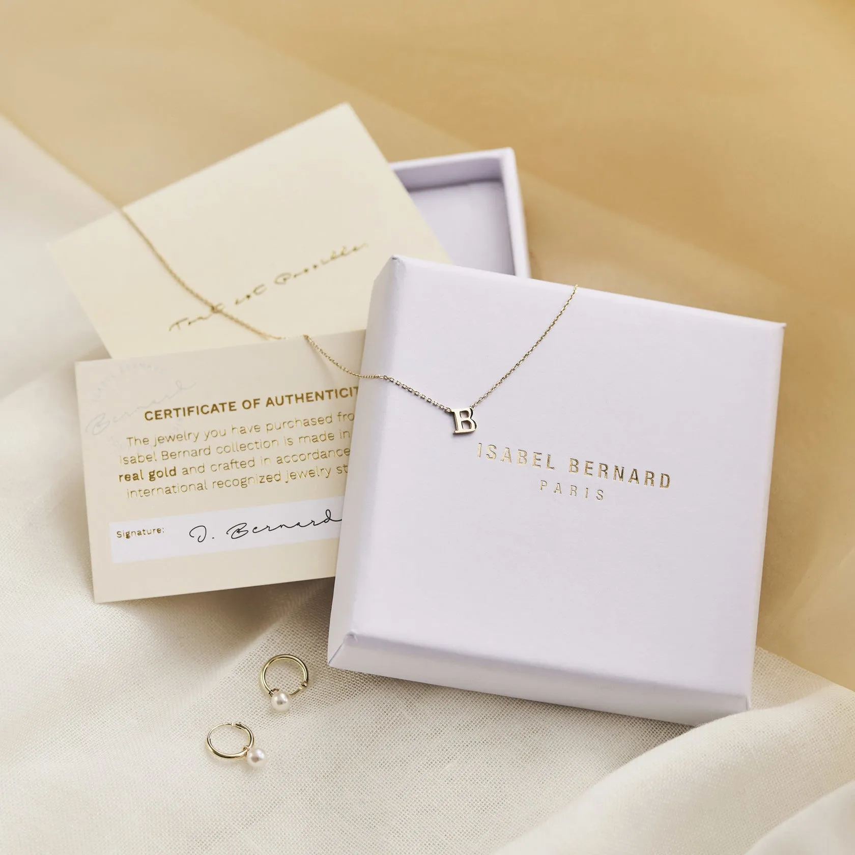 Cadeau d'Isabel 14 karat rose gold cube charm with heart and rose gold necklace gift set