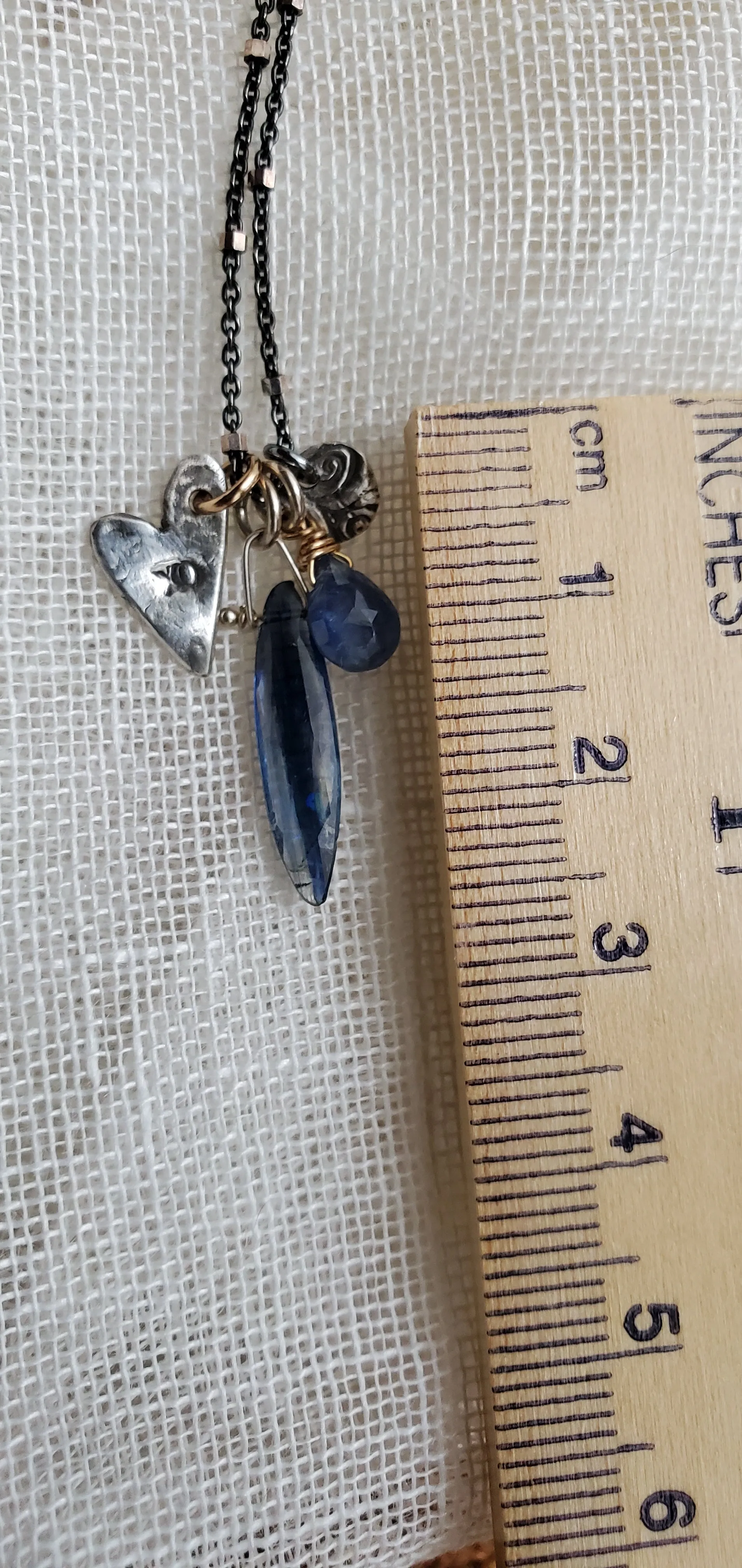 Simon & LuLu multi charm nk